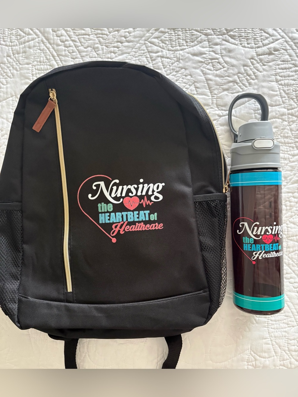 Nursing the Heartbeat of Healthcare Black Backpack and Water Bottle Container